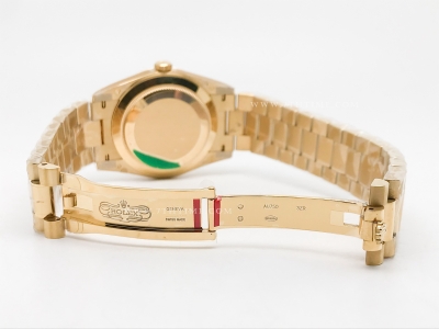 DayDate 40mm 904L Flt Wt YG/YG Grn/Rm/Stk TMF SH3255